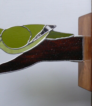 Stained Glass Green Woodpecker on Wood